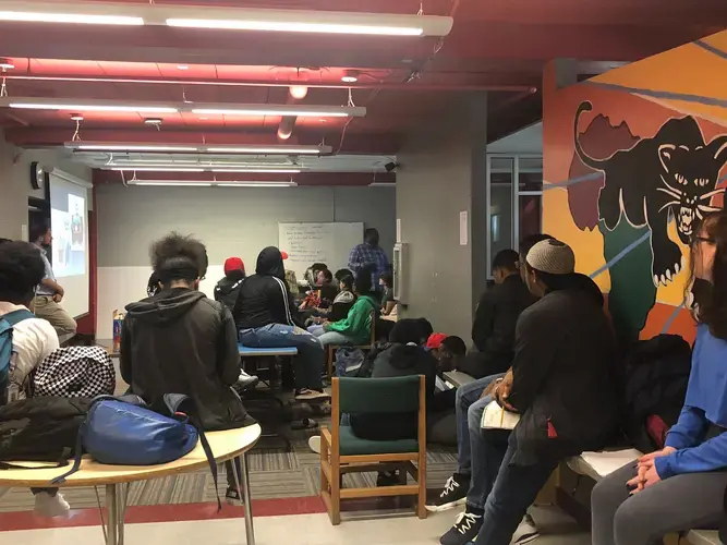 Journalists Kevin Richardson and Justin Fenton from the Baltimore Sun presents to students at Bard Early College High School in Baltimore. Image by Hannah Berk. United States, 2019.