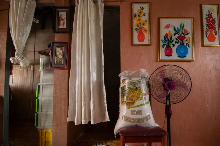 Baniata says she and her husband had to build their own rooms inside their unit. Image by Micah Castelo. Philippines, 2019.