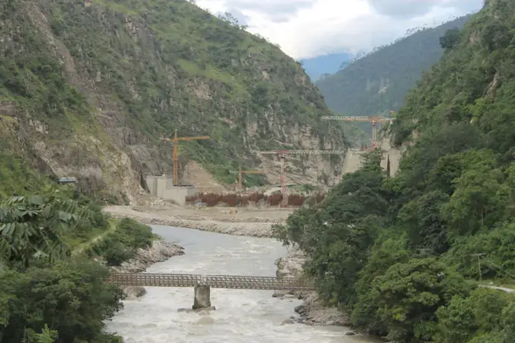 An upstream view of the dam construction work at the Punatsangchhu-II Hydropower Plant, one of the two major new projects under construction. Image by Emma Johnson. Bhutan, 2019.