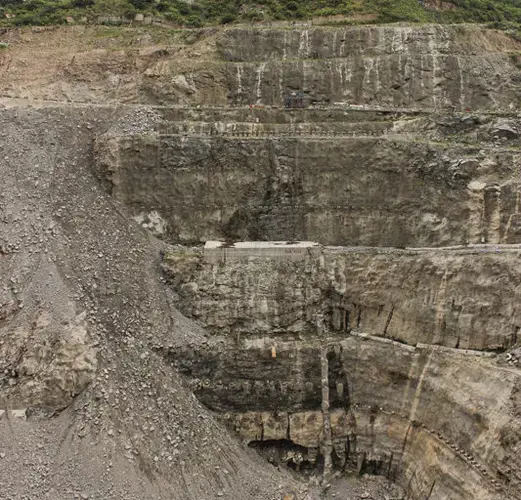 Construction at the dam site of the Punatsangchhu-I Hydropower Plant is constantly delayed because the left bank is geologically unstable and keeps collapsing in landslides. The rock is moving forward at a rate of 7-8 mm a month. Image by Emma Johnson. Bhutan, 2019.