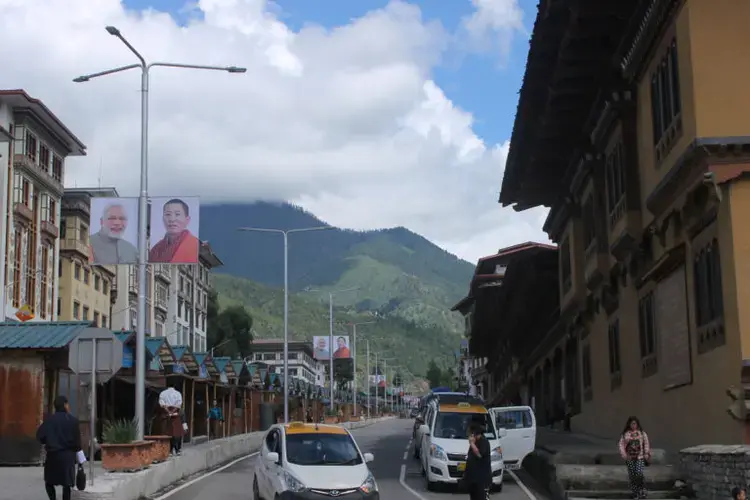Flags are hung across the capital city of Thimphu depicting Indian Prime Minister Narendra Modi and Bhutanese Prime Minister Lotay Tshering as Bhutan geared up for Modi’s two-day visit to the country in August, 2019. Image by Emma Johnson. Bhutan, 2019.
