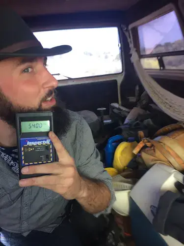 Lucas Hixson checking the radiation levels in his beard. Image by Ben Mauk. United States, 2017.
