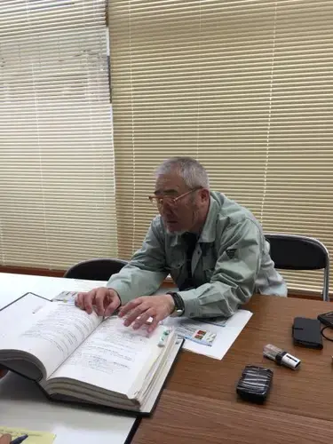 The chief of Kesennuma's Disaster Preparedness office on 3/11, Kenichi Sato details the Japanese tsunami warning system. Image by Matthew Komatsu. Japan, 2011.