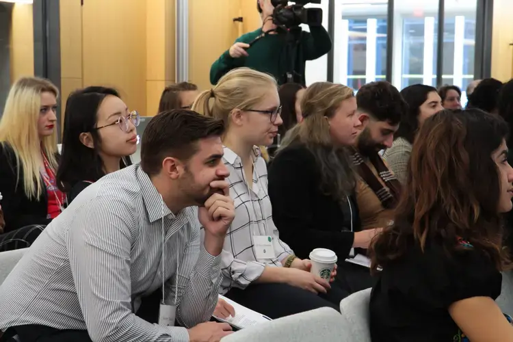 The fellows listen as five seasoned journalist gave advice on reporting in unfamiliar cultural contexts. Image by Libby Moeller. United States, 2019.