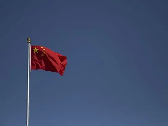 The Peoples Republic of China flag flies over Tiananmen Square on Friday, Sept. 22, 2017. Image by Kelsey Kremer. China, 2017.