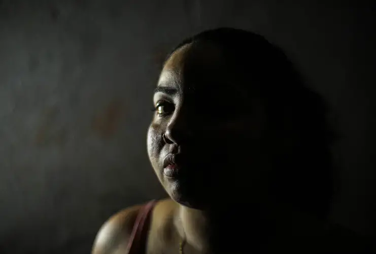 Several months into her multi-drug therapy treatment, Denise Almeida, 24, is hoping to rejoin the workforce to provide for her three children. While she said it would be difficult to go back to her “regular life” she is excited to be rid of leprosy. Image by Anton L. Delgado. Brazil, 2020.