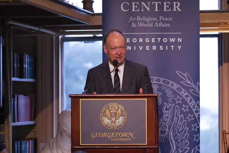 Georgetown President John DeGioia addresses journalists, theologians and scholars at the dinner, highlighting the impact of the Berkley Center and the Pulitzer Center on the Georgetown community. Image by Jin Ding. United States, 2019.