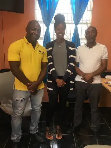 Monica Long (middle) poses alongside The National Organization of Deported Migrants (NODM) President Oswald Dawkins (left) and Treasurer Dwight Jones (right). Image by NODM Vice President Anjuline Green. Jamaica, 2018.