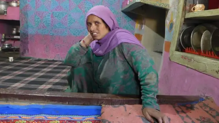 Tahira Akhter has four children with barely a gap of one year between each child. 'I have come across only two to three women in my village who are using birth control methods.' Image by Safina Nabi. Kashmir, 2020.