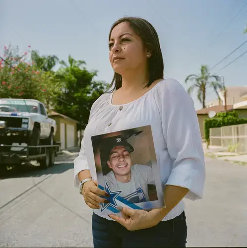 A portrait of Maria Elena Dominguez near the spot where her son was kidnapped. Image by by Christopher Lee. Mexico, 2020.