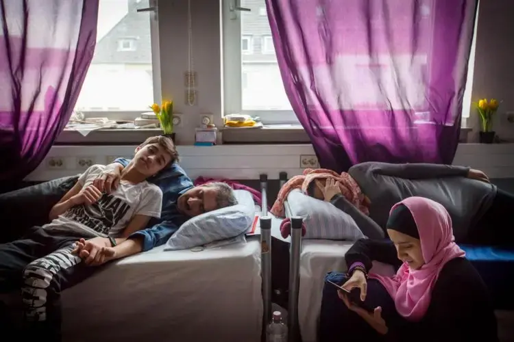 Milad's family. Image by Diana Markosian. Germany, 2017.