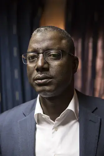 Justice Minister Marou Amadou poses for a picture in his office in Niamey, Niger, Jan. 21, 2018. Image by Joe Penney. Niger, 2018.