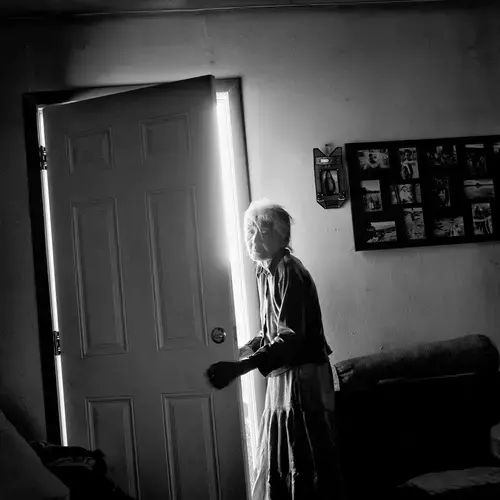 Gap, Ariz. | Nellie Yellowhorse, 90, at her family’s ranch home in the Navajo Nation; she lives with her two elderly sisters in the house, which has no running water. Image by Matt Black—Magnum Photos for TIME. United States, 2019.