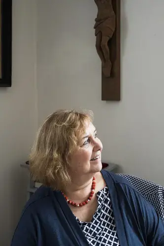Renate Schieferdecker, the Christian pastor in the nearby town of Amt Neuhaus, remembers when locals first learned of the coming asylum seekers. 'We were naturally concerned when the news came,' she said. Among the concerns was the threat of violence. 'Any time you get an Afghan and a Persian together, there will be conflict.' Most of the worries proved unfounded, she later said. Image by Valerie Schmidt. Germany, 2017.