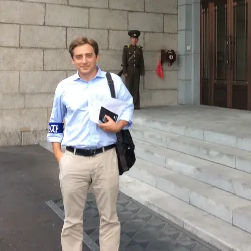 Evan Osnos at the Ministry of Foreign Affairs. Image by Max Pinckers. North Korea, 2017.