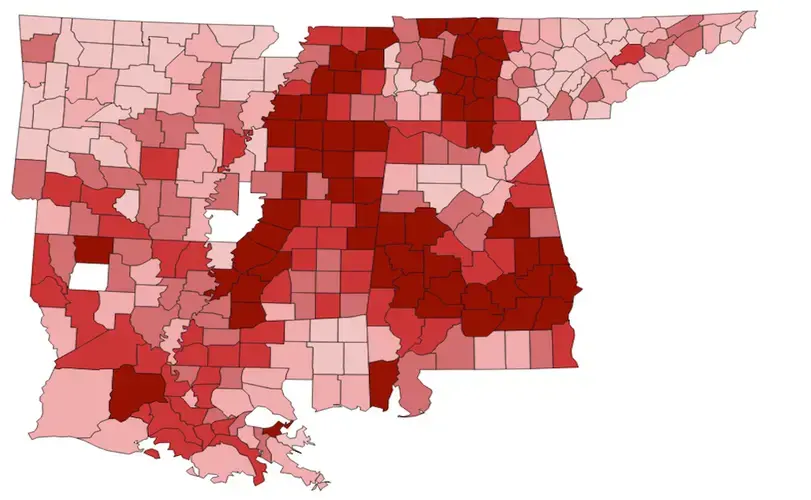 This map depicts the population of those enslaved in 1860; the deeper the red, the higher numbers of those enslaved. Those areas overlap closely with the lack of ICU beds in the above blue map. Sources: 1860 Census, Hope Enterprise maps and data. Map by Kristine de Leon / Mississippi Free Press. United States, undated.<br />
