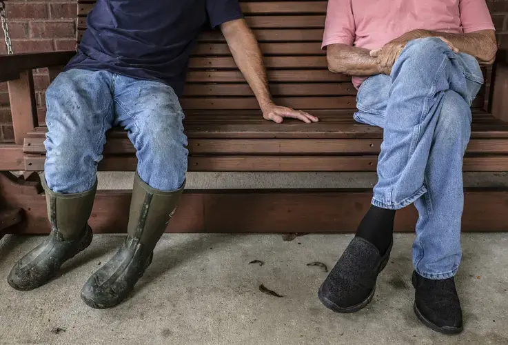 Fishermen Chad Stork, left, and Wayne Tillman at Stork’s home in Lucedale. Image by Eric J. Shelton for Mississippi Today. United States, 2019.