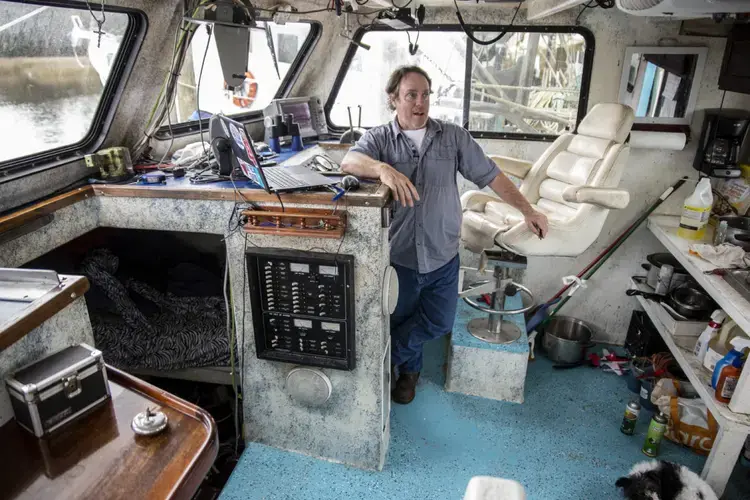 Fisherman Frank Parker at Ocean Springs Harbor. Monday, Feb. 18, 2020. Image by Eric J. Shelton/Mississippi Today. United States, 2020.