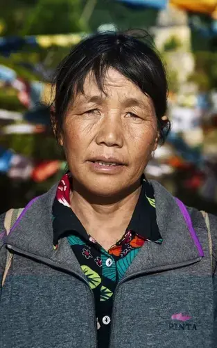 Sadama Rada’s mother, Bi Ma Rada. Image by Jason Motlagh. China, 2017.<br />
