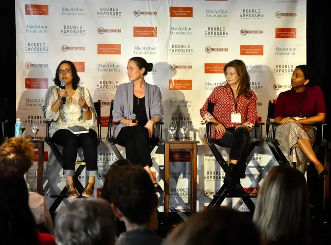 Carrie Lozano —director of the International Documentary Association's Enterprise Documentary Fund— answers audience questions as Nathalie Applewhite from the Pulitzer Center, Wendy Ettinger from Chicken & Egg Pictures, and Lea Trusty from the Democracy Fund listen. Image by Katie Brown. United States, 2019.