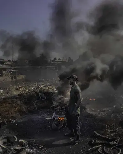 Prolific particulate pollution in Onitsha has prompted the World Health Organization to rank the city among those with the worst air globally. Image by Larry C. Price. Nigeria, 2018.