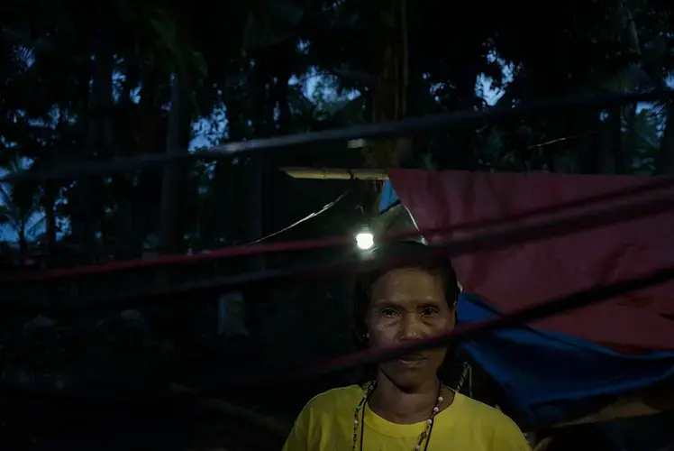 Inday Bantay, another survivor staying in the sanctuary in Koronadal City, lost her son during the shooting. Image by Chien-Chi Chang/Magnum Photos. Philippines, 2018.