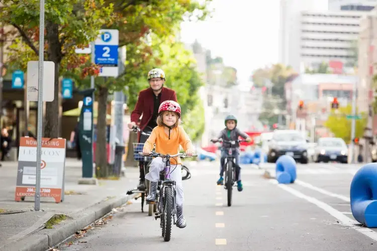 Parents need to keep an eye on their little ones to help them develop road safety skills. Image courtesy of Adam Coppola Photography.