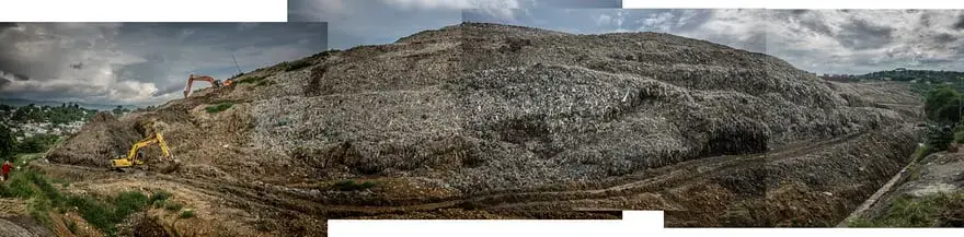 This huge mountain of trash in Payatas provides a living to residents on its fringes, through picking recyclables from the other trash and selling it to dealers in the community. Payatas has been plagued by drug use and, as a result, it has been a magnet for the masked assassins who carry out extrajudicial killings, leaving many families without a breadwinner. Image by James Whitlow Delano. Philippines, 2018.