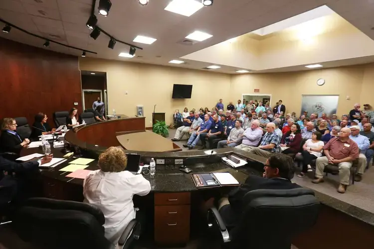 There was standing room only at a public hearing in Lucedale Tuesday, May 14, 2019, for a proposed wood pellet plant environmental permit in George County. If approved, the Enviva pellet plant would be the largest in the nation. Image by Alyssa Newton. United States, 2019.