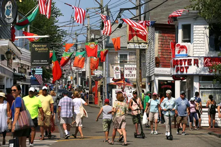 Crowds filled Commercial Street in downtown Provincetown. Image by John Tlumacki. United States, 2019.