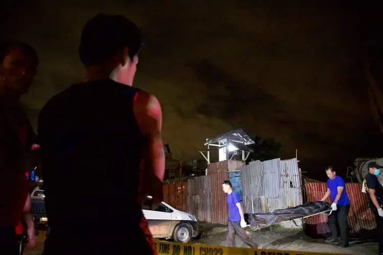 A crime scene in Navotas City, Philippines, one of the places that have become notorious for drug-related killings. Image by Pat Nabong. Philippines, 2017.