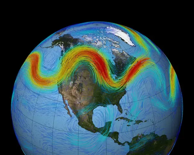 Meandering around the planet like a roller coaster in the sky, the jet stream is a fast-moving belt of westerly winds. It’s created by the convergence of cold air masses descending from the Arctic and rising warm air from the tropics, its momentum accelerating because of the Earth’s rotation. Graphic courtesy of NASA.<br />
