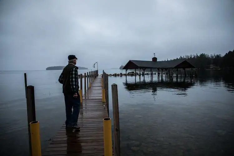 Robert Smith, president of Les Cheneaux Watershed Council, at his home in the Upper Peninsula of Michigan on Nov. 20, 2019. 'You're living on the lake, on the lake's terms,' he said. Image by Zbigniew Bzdak / Chicago Tribune. United States, 2020.