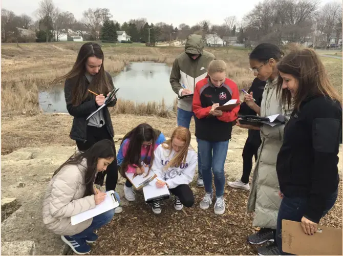 Students compare notes on what they find on their slow journalism walks. Modern learning gets students out their classrooms and into the world around them.<br />