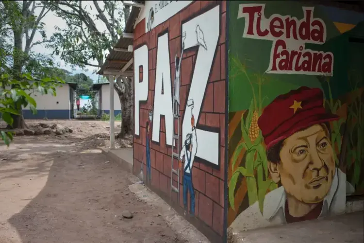 In this territorial space of training and reincorporation (ETCR), in La Guajira, there are 222 members of the former guerrilla group who, despite the anxiety and uncertainty they experience these days, still have faith in a sustainable transition to civil life. Image by Fabio Cuttica. Colombia, 2018.<br />