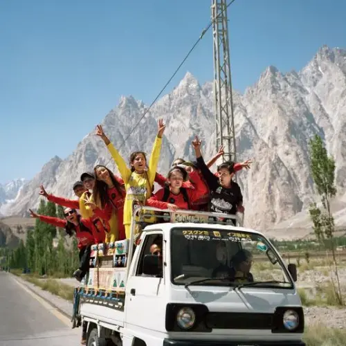 Teenage girls from Gulmit load up in a van after an all-female soccer tournament meant to promote gender equality in the Hunza valley of northern Pakistan. Image by Sara Hylton/National Geographic. Pakistan, 2019.