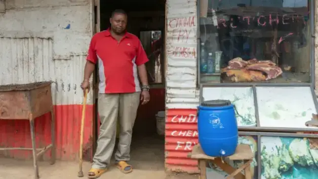 Daniel Masai, a butcher and resident of the Laini Saba neighborhood of Kibera, Nairobi, Kenya. He is supposed to be part of the second phase in the UN Habitat-funded Kenya Slum Upgrading Program but he hasn’t received any information. Image by Peter DiCampo. 2018. 