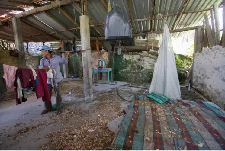 Salomon Lara Tlaltempa visits the home of his 24-year-old son, who was among six people killed by armed men on Jan. 6, 2016. Image by Omar Ornelas. Mexico, 2019.