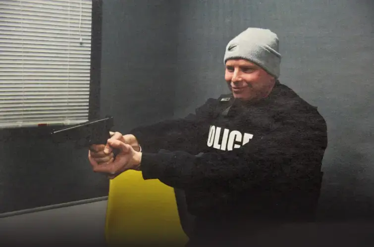 Bail bondsman Donald Stepp dealt drugs for Sgt. Wayne Jenkins and sometimes accompanied him to police headquarters. Here, in an undated photo, Stepp is seen goofing around with police gear. Baltimore, Maryland, 2019. Image by U.S. Attorney’s Office.