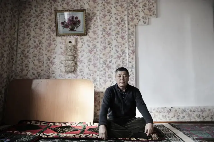Nurlan Kokteubai at his home in Shonzhy, Kazakhstan, Feb. 26. Image by Ekaterina Anchevskaya For BuzzFeed News. Kazakhstan, 2020.