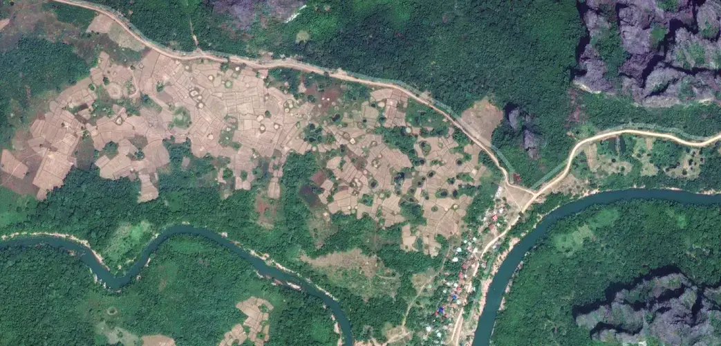 Hundreds of bomb craters scar Ban Senphan Village on the border of Laos and Vietnam Image by Erin McGoff. Laos, 2017.