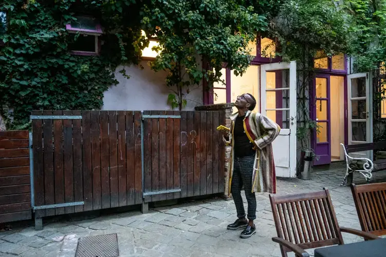 Faris outside their office at 'Queer Base' in Vienna's gay-friendly district. Image by Bradley Secker. Austria, 2020.