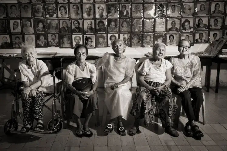 Remedios Tecson (from left), sisters Estela Adriatico and Narcisa Claveria, Felicidad delos Reyes and Estelita Dy were teens when they were sexually enslaved. Many of the estimated 1,000 Filipinas who served as 'comfort women' died of injuries or illness. Survivors suffered from post-traumatic stress disorder. Many went on to marry but said their wartime experiences made them societal outcasts. Image by Cheryl Diaz Meyer. Philippines, 2019.