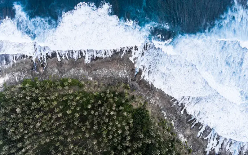 Aerial view of the coast of Simeulue Island in Indonesia. Image by Nithin Coca. Indonesia, 2019. 