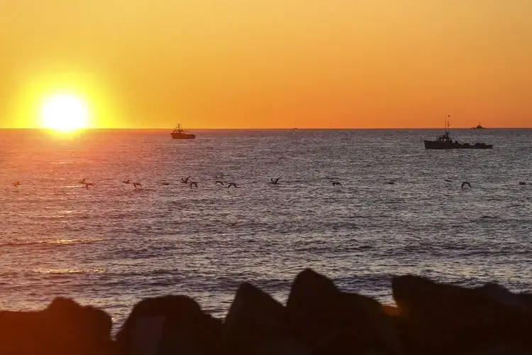 Lobstermen fished off of Miscou Island at sunrise. Image by Nathan Klima. Canada, 2019.