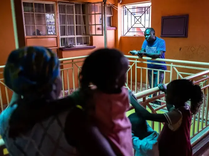Former Uber driver Harrison Munala outside his former apartment Oct. 16 in Nairobi, Kenya, which his wife and their three children were evicted from in mid-August after they fell behind on their rent. Image by Nichole Sobecki/NBC News. Kenya, 2020.</p>
<p>