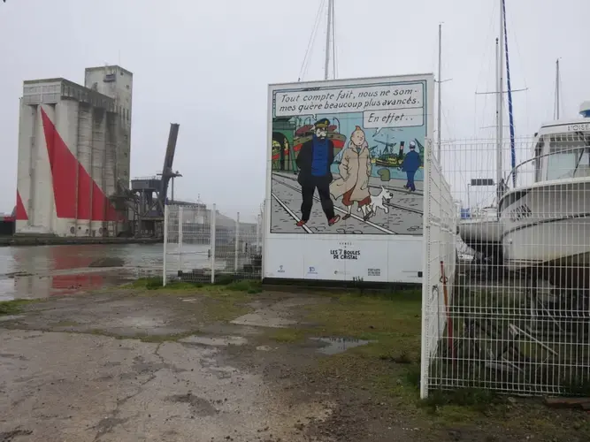 An image from 'The Seven Crystal Balls,' in which Tintin visits the Saint-Nazaire shipyards in the period before the war when it was a thriving transatlantic harbor. Image by Jeanne Carstensen. France.