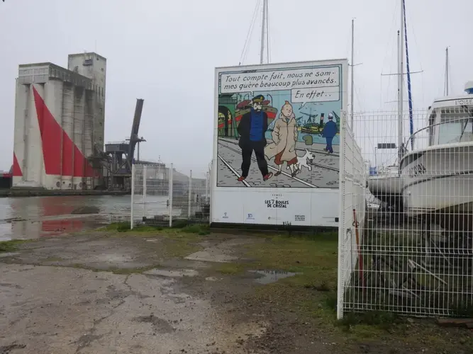 An image from 'The Seven Crystal Balls,' in which Tintin visits the Saint-Nazaire shipyards in the period before the war when it was a thriving transatlantic harbor. Image by Jeanne Carstensen. France.