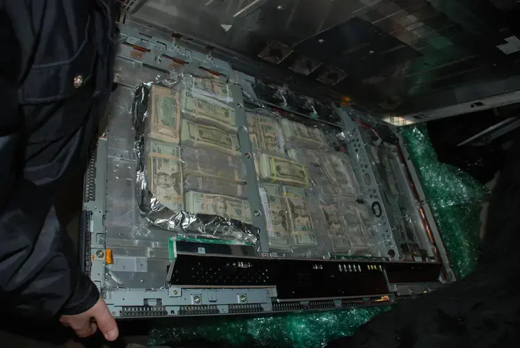A photo provided by the Phelps County Sheriff's Department shows a flatscreen TV stuffed with cash that the department seized. Image released by Phelps County Sheriff's Department.