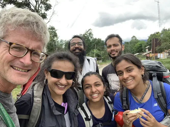 Salopek, left, poses with his Indian walking partners Arati Kumar-Rao, second from left, and, back row, Siddharth Agarwal and Hormazd Mehta, join with two young hikers near Imphal, India, as they neared the Myanmar border. Image by Paul Salopek. India, 2019.
